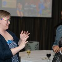 two women chat at GVSU event